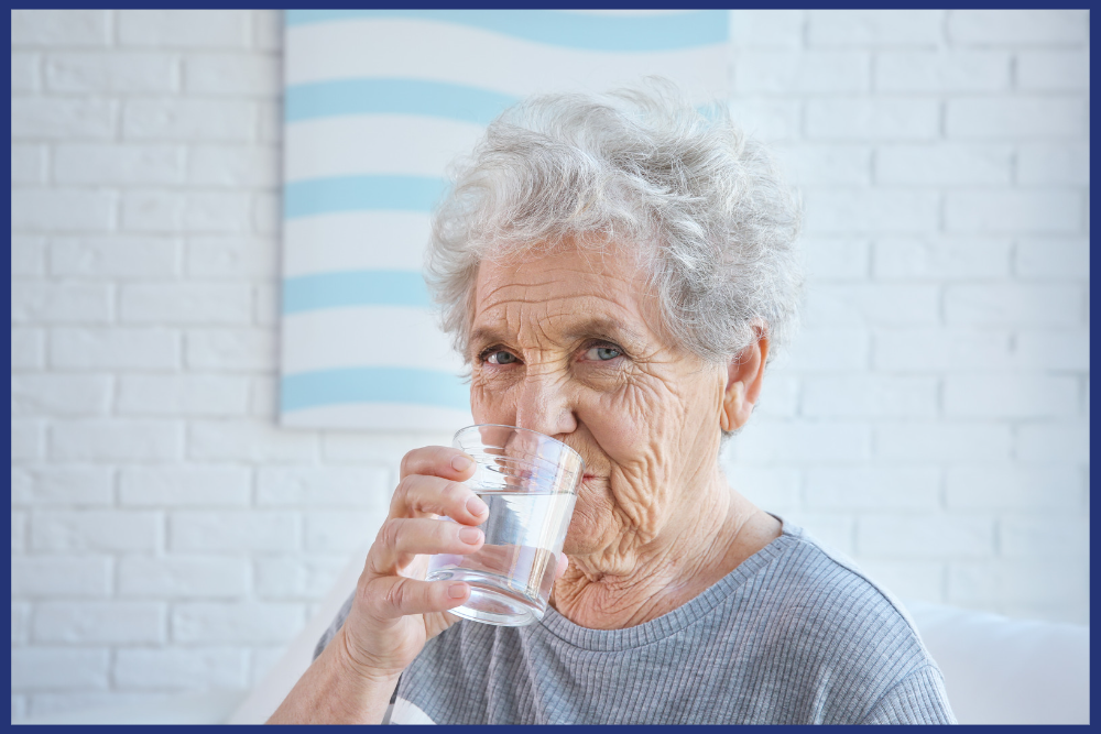 elderly woman drinking water